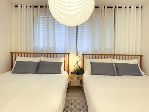 2 عدّة غرف نوم ومكواة/لوح كي وواي فاي وملاءات أسرّة