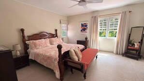 A bedroom with a bed, bedside table, lamp, and a window with curtains. - Jack's Place - by Zenbreak (Mullins)