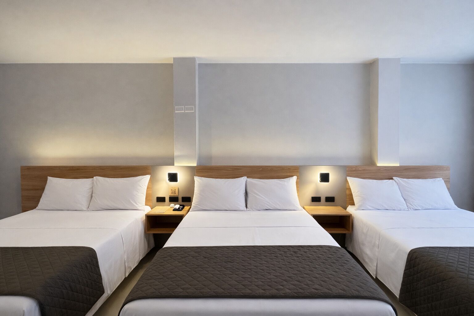 Deluxe Triple Room | In-room safe, desk, laptop workspace, blackout drapes