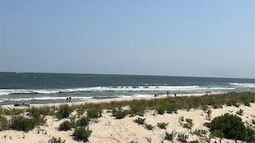 On the beach, sun-loungers, beach towels