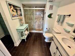 Shower, hair dryer, towels, soap