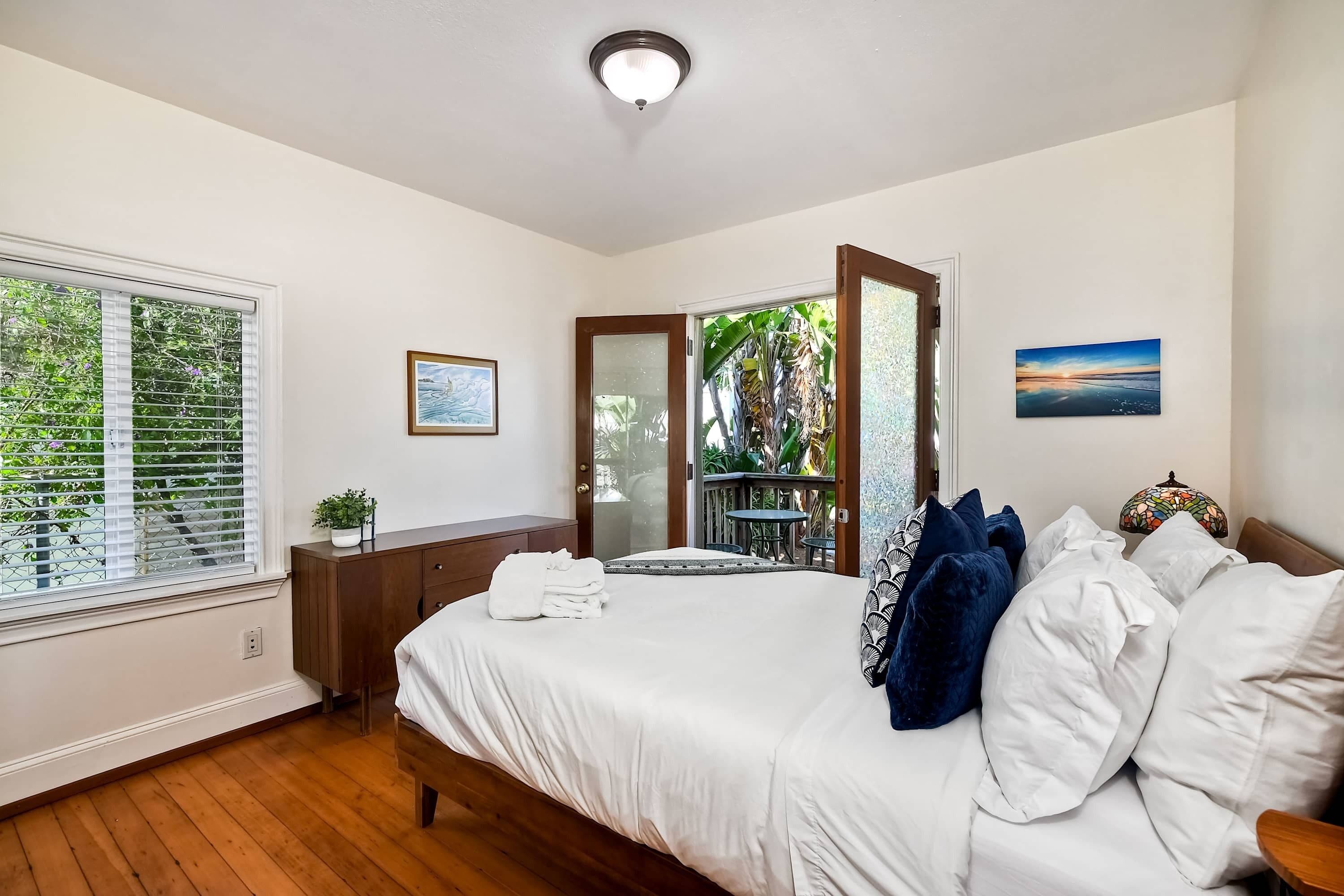 House, Multiple Beds, Patio, Garden View (Vintage Beach Bungalow) | 3 bedrooms, individually decorated, individually furnished, bed sheets