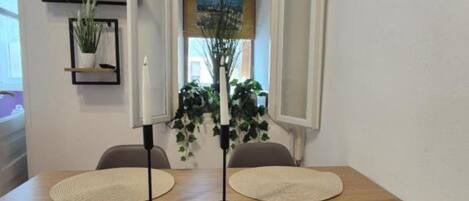 Apartment (One Bedroom Apartment) | Living room | 32-inch flat-screen TV with cable channels