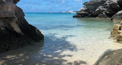 Spacious 4-bedroom beachfront estate in tranquil Somerset Village with AC, WiFi