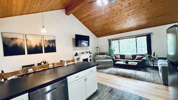 Smart TV, fireplace, foosball, books