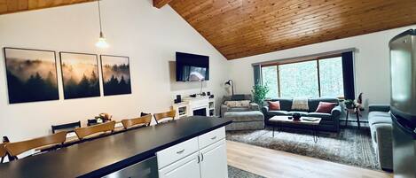 Smart TV, fireplace, foosball, books