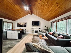 Smart TV, fireplace, foosball, books