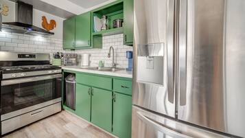 Microwave, coffee/tea maker, blender, cookware/dishes/utensils