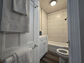 Hair dryer, towels, soap, toilet paper