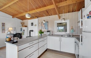 Fridge, stovetop, coffee/tea maker