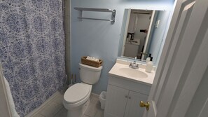 Hair dryer, towels, soap, toilet paper