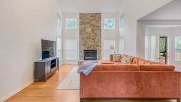 Smart TV, fireplace, books