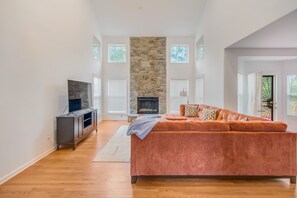 Smart TV, fireplace, books
