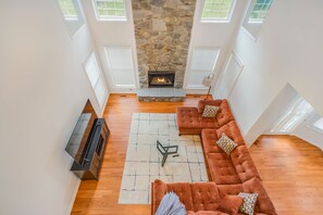 Smart TV, fireplace, books