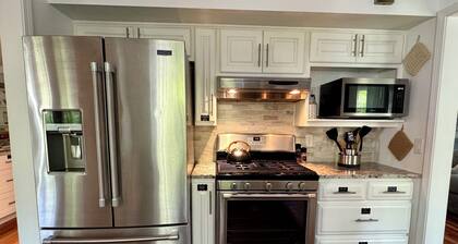 The Big Blue House – Spacious Bryan Retreat w/Game Room & Dog-Friendly Yard