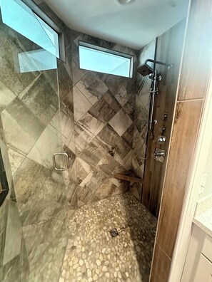 Shower, hair dryer, towels, soap
