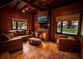 Superior Cabin | Living area | 32-inch flat-screen TV with cable channels, table tennis