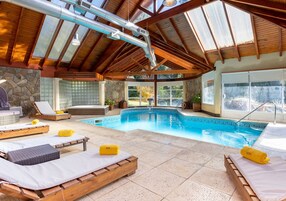 Indoor pool, seasonal outdoor pool, pool umbrellas, sun loungers