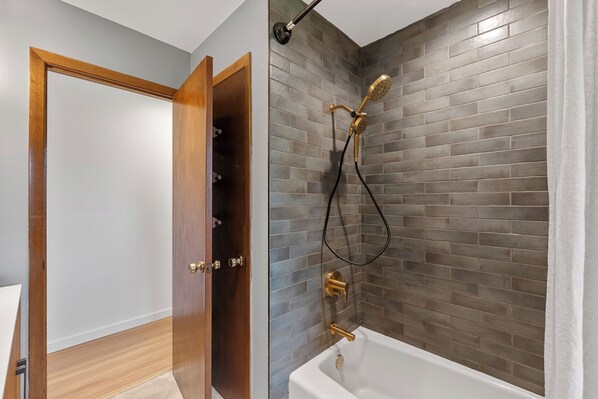 Shower, hair dryer, towels, soap