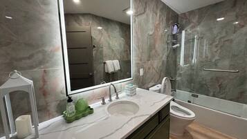 Hair dryer, bidet, towels, soap