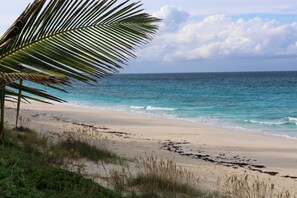On the beach, sun-loungers, beach towels - Serene 2-Bedroom Bahamas Villa on Great Guana Cay Steps from Private Beach & Sea (Great Guana Cay)