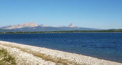Glacier National Park views from this private nearby Duck lake waterfront home.