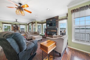 Smart TV, fireplace, foosball, books