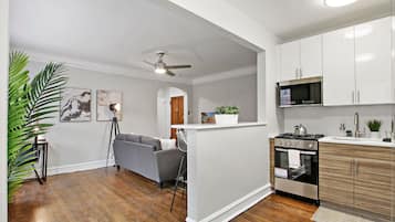 Comfort Apartment | Private kitchen | Fridge, microwave, oven, stovetop
