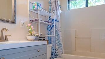 Hair dryer, towels, soap, toilet paper