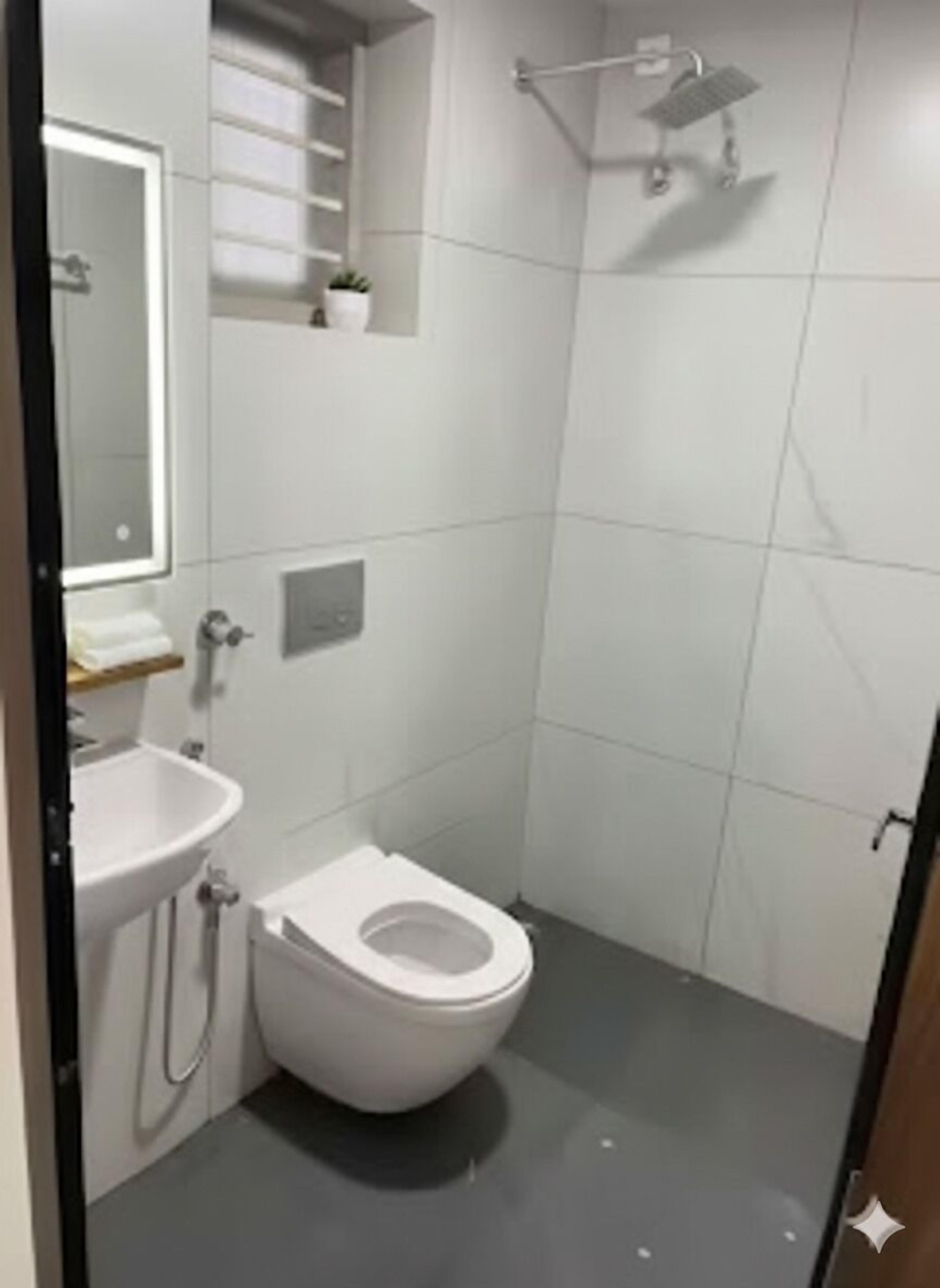 Shower, towels, soap, toilet paper