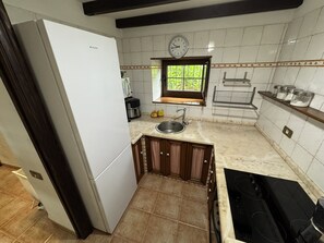 Fridge, microwave, toaster, cookware/dishes/utensils