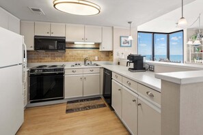Coffee/tea maker, fridge, microwave, oven - Sea Pointe 702: End unit with endless shoreline views, overlooking sought-after Cherry Grove Point. (North Myrtle Beach)