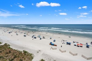 On the beach - Sea Pointe 702: End unit with endless shoreline views, overlooking sought-after Cherry Grove Point. (North Myrtle Beach)