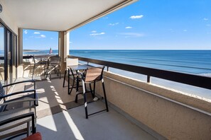 Outdoor dining - Sea Pointe 702: End unit with endless shoreline views, overlooking sought-after Cherry Grove Point. (North Myrtle Beach)