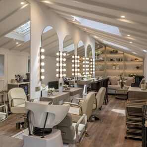 A modern interior with a vanity area, seating, and a skylight. - 5 Star Luttrellstown Castle - Dublin’s Timeless Luxury Awaits (Dublin)