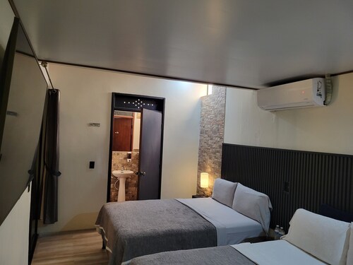 Double room 04 with 2 double beds, air conditioning, private bathroom