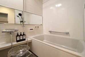 Hair dryer, bidet, towels, soap