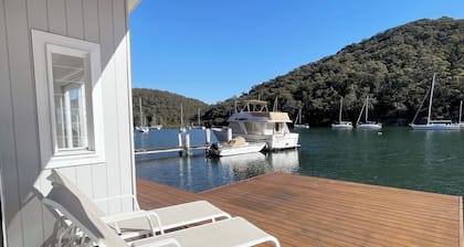 Waterfront Boathouse Stay with Open Deck and Views