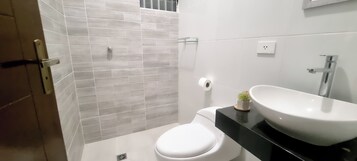 Shower, towels, soap, toilet paper