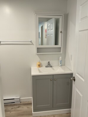 Hair dryer, towels, soap, toilet paper