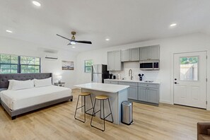 Fridge, microwave, stovetop, coffee/tea maker