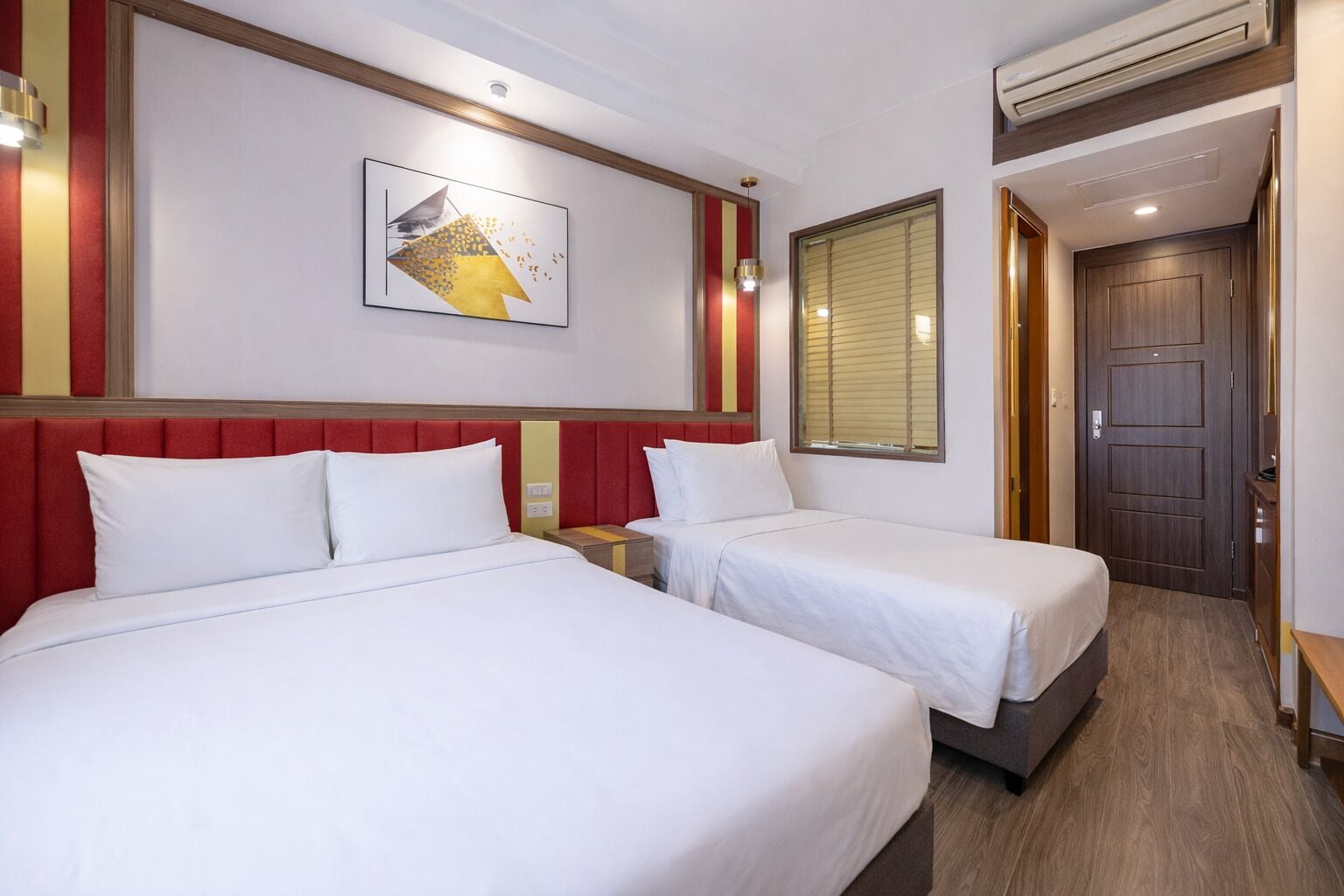 Deluxe Triple Room, Non Smoking, City View | Premium bedding, pillowtop beds, in-room safe, desk