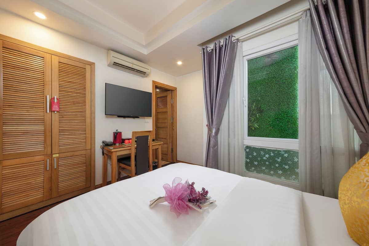 Habitación doble superior, para no fumadores, vista al patio | Ropa de cama de alta calidad y camas con pillow-top