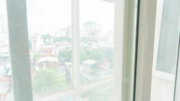 Presidential Quadruple Room, Non Smoking, City View | Premium bedding, pillowtop beds, in-room safe, desk