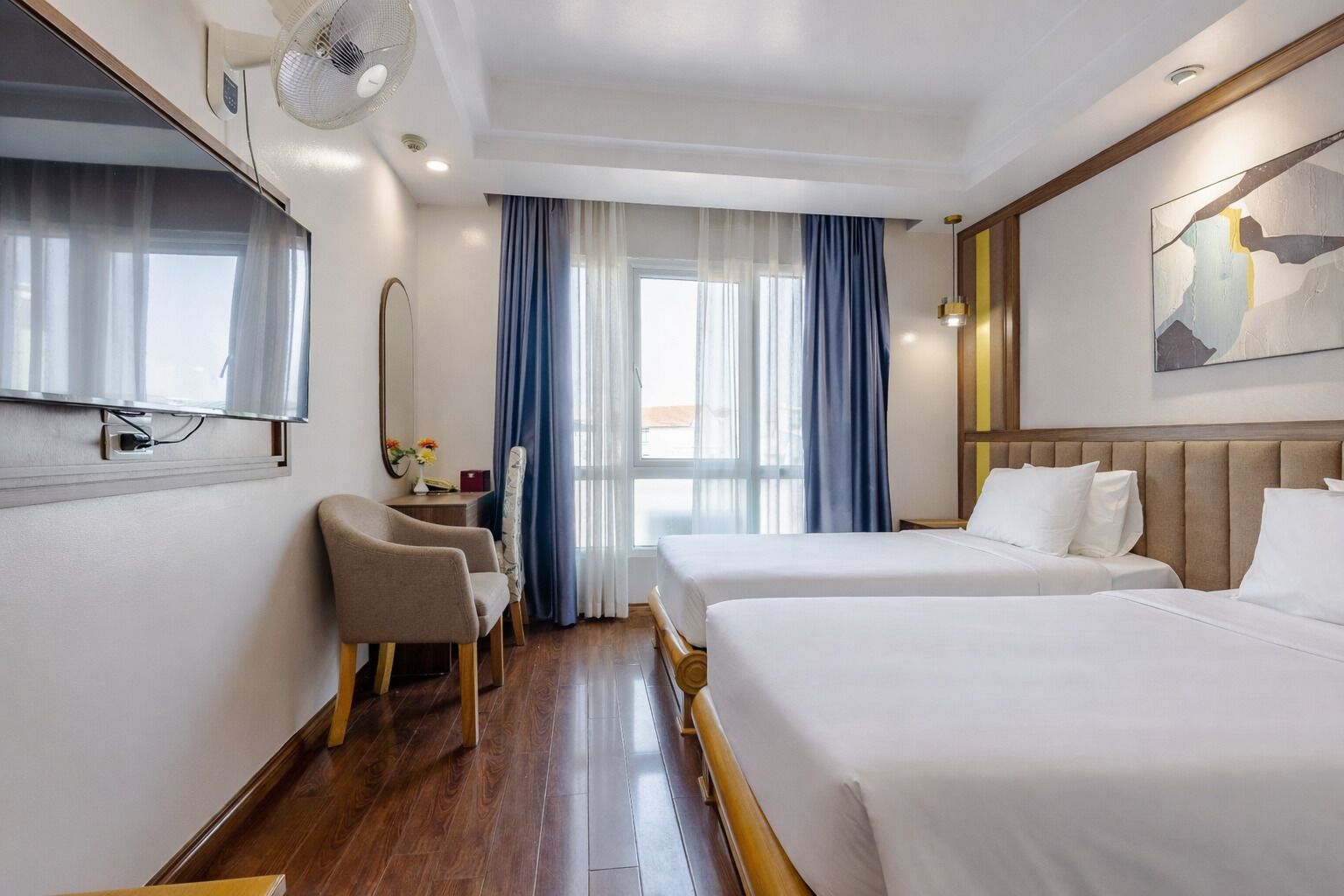 Chambre Deluxe Double ou avec lits jumeaux, non-fumeurs, vue ville | Literie de qualité supérieure, surmatelas