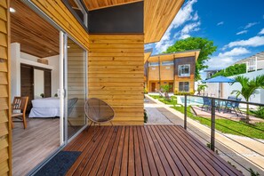 Terrace/patio - Modern condo with pool access, outdoor grill area, WiFi & central AC (Playas del Coco)