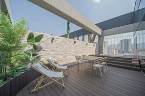 Signature Room, Multiple Beds, Hot Tub, City View | Terrace/patio