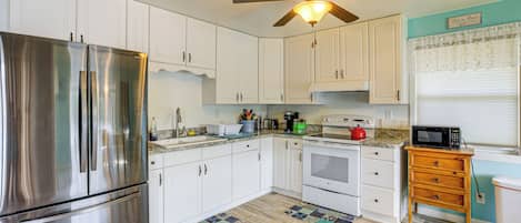 Fridge, microwave, stovetop, coffee/tea maker