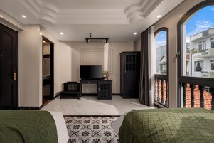 Deluxe Twin Room, Balcony | Minibar, in-room safe, desk, soundproofing