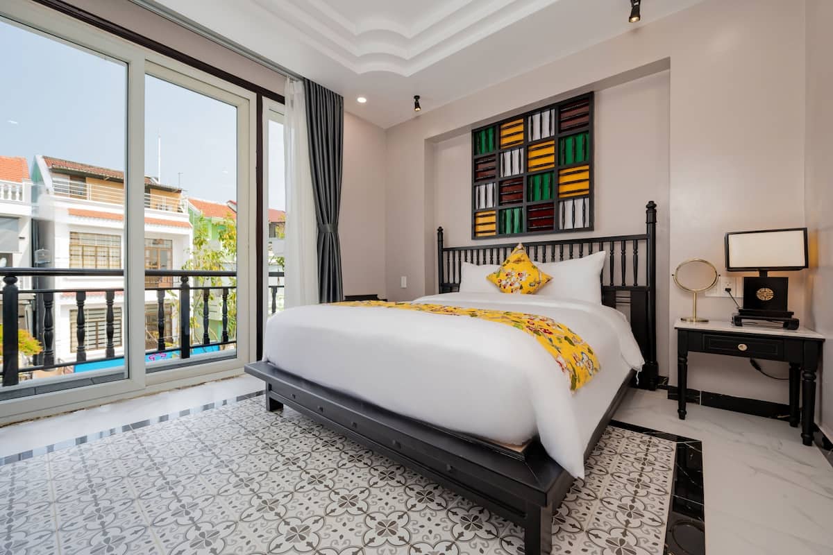 Deluxe Double Room, Balcony | Minibar, in-room safe, desk, free WiFi